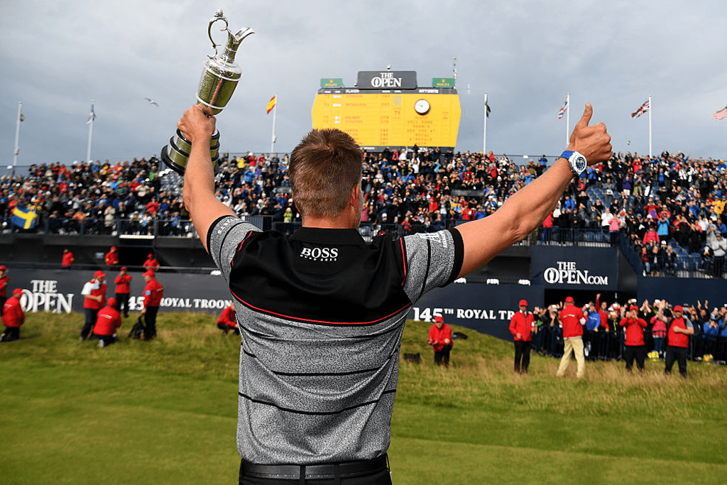 Henrik Stenson parades the Claret Jug in front of the Troon galleries after winning The Open in 2016